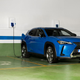 A photo of a blue Lexus UX 300e plug-in hybrid SUV.